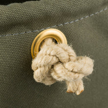 Load image into Gallery viewer, Close up of Cobb Canvas khaki bucket showing the brass eyelet and knotted end of the rope handle
