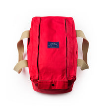 Load image into Gallery viewer, Overhead image of the Cobb Canvas Cabin Bag in red. Showing the top panel with zips to either side. Ideal as a travel bag.
